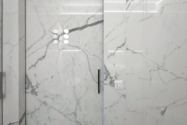 Porte de salle de bains coulissante réalisée en carrelage imitation marbre Calacatta