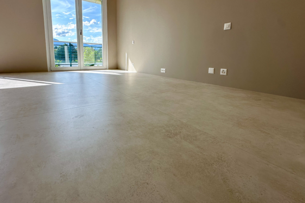 chambre coucher carrelage imitation beton beige 2 renovation appartement Nyon