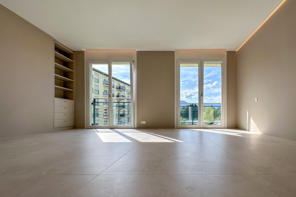 chambre coucher carrelage imitation beton beige 3 renovation appartement Nyon